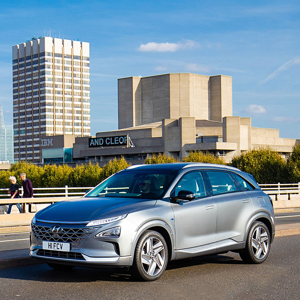 Front view of Hyundai car running on the bridge